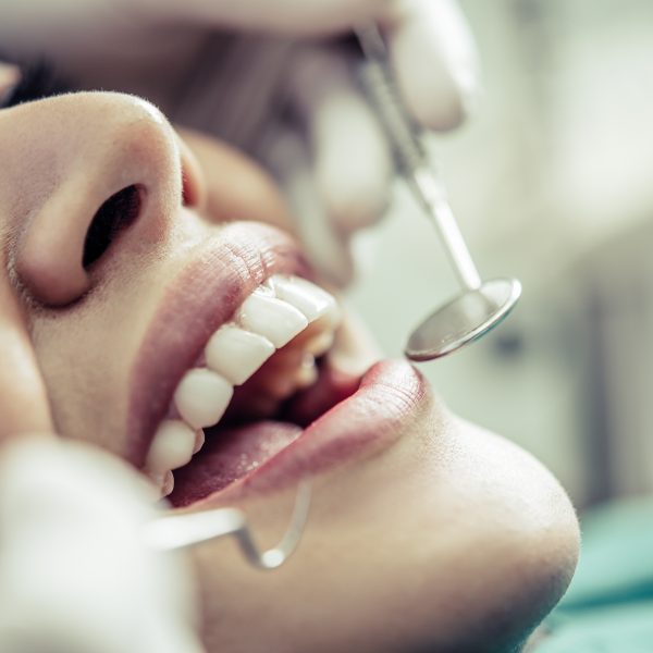 Dentists treat patients' teeth.